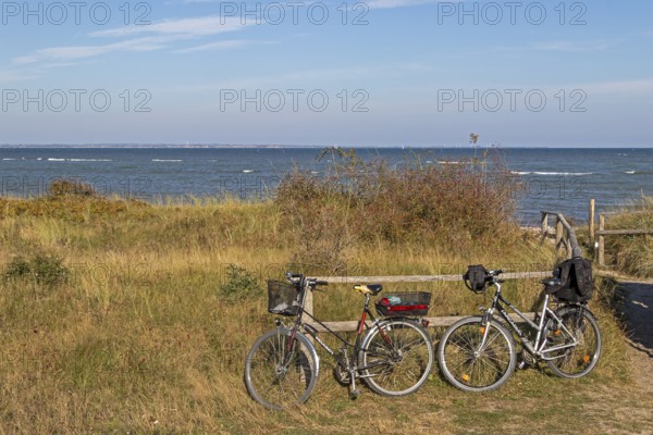 Parked bicycles, Baltic Sea, Geltinger Birk nature reserve, Nieby, Schleswig-Holstein, Germany
