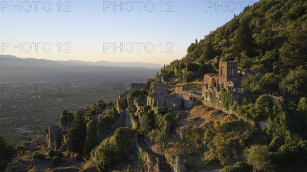 Church of Agia Sophia from the 14th century AD, Medieval ruins on a hill in the light of the sunset, surrounded by nature, Mystras, Mistra, UNESCO World Heritage Site, Medieval Byzantine ruined city, northwest of Sparta, foothills of the Tyagetos Mountains, Peloponnese, peninsula, Greece