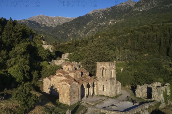 Drone shot, Church of Agia Sophia from the 14th century AD, Old Byzantine church in a quiet mountain landscape with ruins, Mystras, Mistra, UNESCO World Heritage Site, Medieval Byzantine ruined city, northwest of Sparta, foothills of the Tyagetos Mountains, Peloponnese, peninsula, Greece
