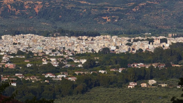 Panorama of a sprawling city in the middle of a green landscape under a blue sky, Sparta, Mystras, Mistra, UNESCO World Heritage Site, Medieval Byzantine ruined city, northwest of Sparta, foothills of the Tyagetos Mountains, Peloponnese, peninsula, Greece