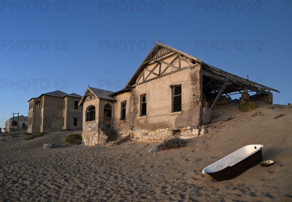 Bathtub in the sand in front of the teacher's house, blue hour, Kolmanskop, near Lüderitz, Karas Region, Namibia