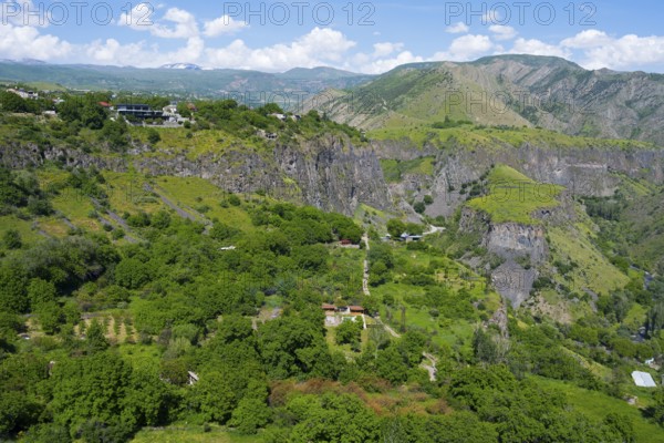 Sweeping view of gorge with scattered houses and lush greenery, Garni Gorge, Azat River, Kotayk Province, Armenia