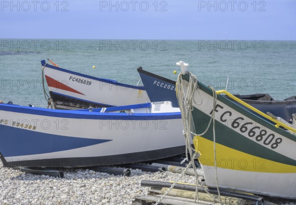 Simple wooden boats on the beach of, Yport, Département Seine-Maritime, France