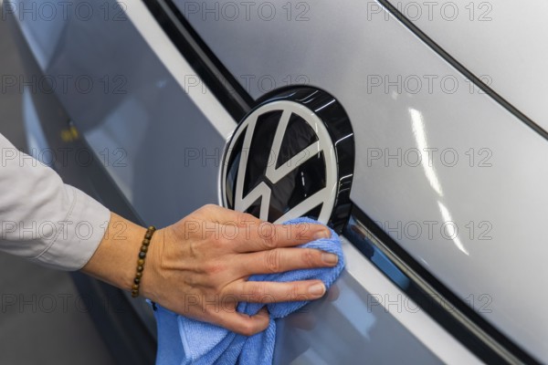 Electric car production in the assembly halls of VW in Zwickau. VW logo, Zwickau, Saxony, Germany