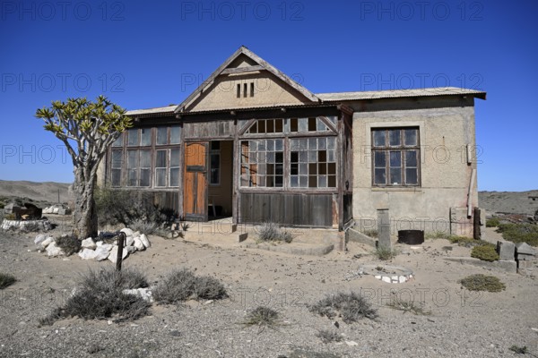 Dilapidated building in the desert sand, Pomona, restricted diamond area, near Lüderitz, Karas region, Namibia