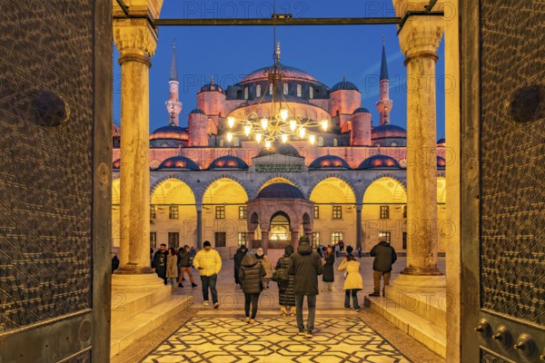 Inner courtyard of the Blue Mosque or Sultan Ahmed Mosque at dusk, Istanbul, Turkey