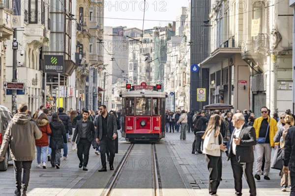 The nostalgic tram on the shopping street Istiklal Caddesi in Beyoglu, Istanbul, Turkey