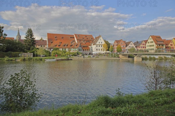 Half-timbered houses, town mill, tithe barn on the banks of the Neckar, pedestrians, boats, riverside promenade, footbridge, underwater, Rottenburg am Neckar, Neckar valley, Baden-Württemberg, Germany
