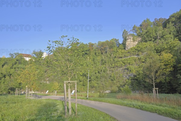 Rock Kapf with cross, rock formation, rock cliff, path, fruit trees, mountain, forest, landscape, Haigerloch, Swabian Alb, Baden-Württemberg, Germany