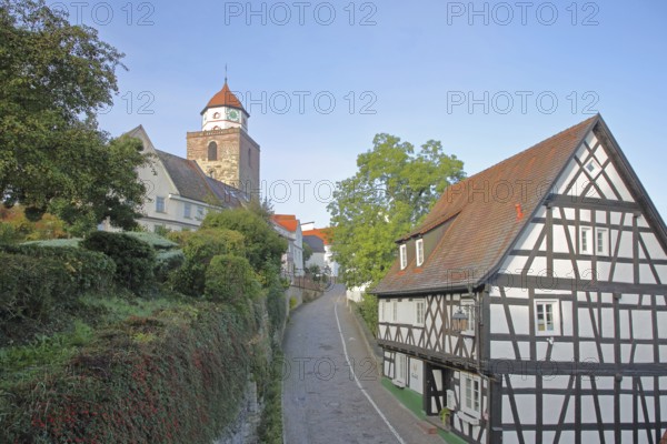 Roman tower built in 1746 and half-timbered house, landmark, town tower, Haigerloch, Swabian Alb, Baden-Württemberg, Germany