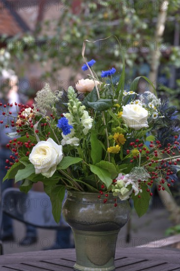 Summer bouquet of flowers on a garden table, Bavaria, Germany