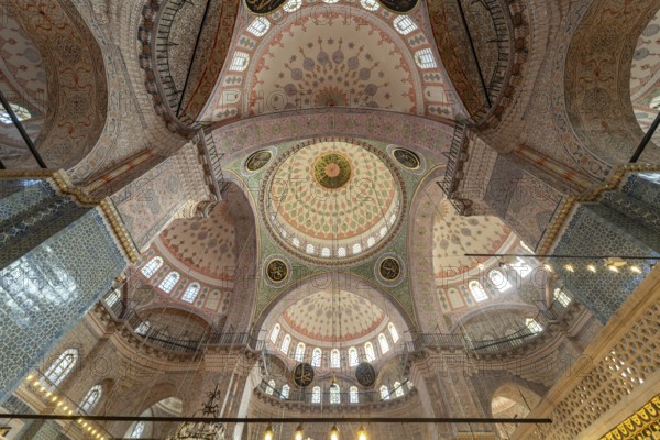 Interior and domes of the New Mosque Yeni Camii in Istanbul, Turkey
