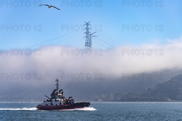 Coastguard boat on the Bosporus in the fog near Istanbul, Turkey