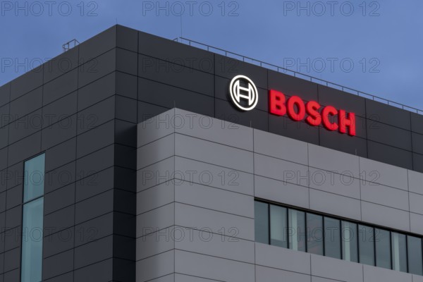 Bosch logo on grey building façade at dusk, Waiblingen, Baden-Württemberg, Germany