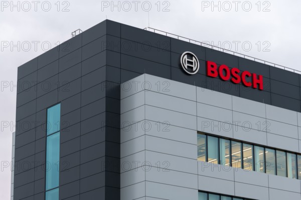 Grey-blue building with Bosch logo and large windows in modern architecture, Waiblingen, Baden-Württemberg, Germany
