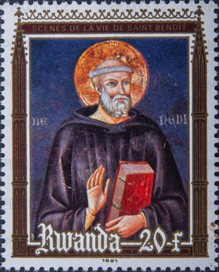 Benedict of Nursia (480-543), monk and founder of the Benedictine Order. Portrait on Rwandan postage stamp