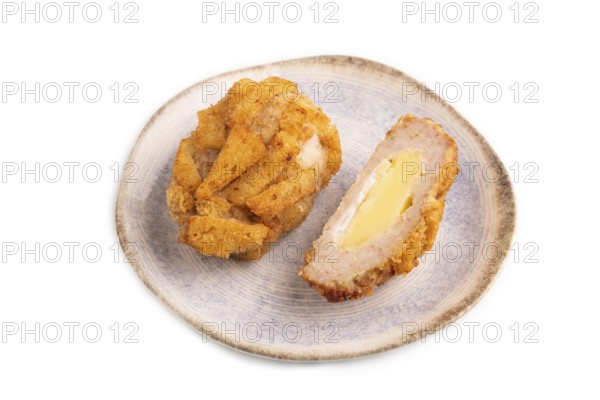 Chicken schnitzel on blue plate isolated on white background. side view, copy space