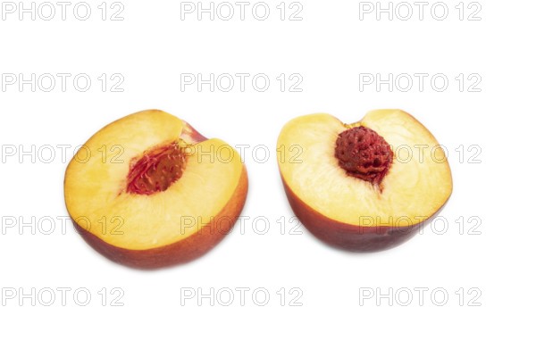 Peach Cut in half isolated on white background. Side view, flat lay, close up. healthy food, vegetable, minimalism
