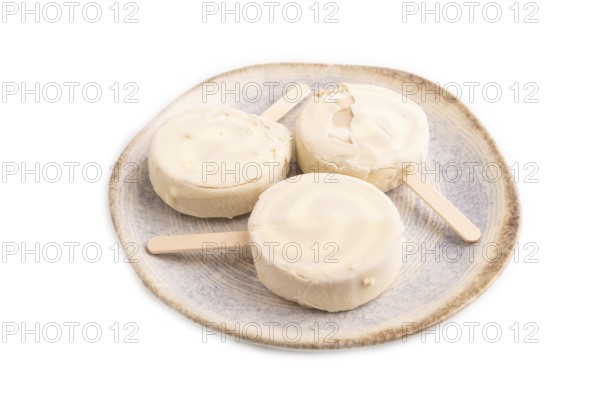 ?hocolate Ice cream in white glaze isolated on white background, side view, close up, minimalism