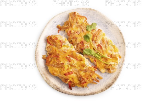 Baked chicken meat with cheese and tomatoes isolated on white background. top view, flat lay, close up