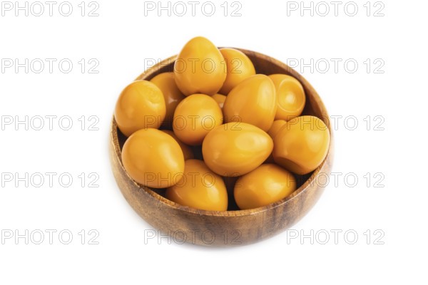 Pile of Smoked Quail eggs isolated on white background. side view, close up