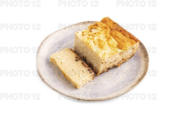 ?ottage cheese ?asserole, Curd cake, with dried apricots and raisins Isolated on white background, side view, close up, minimalism