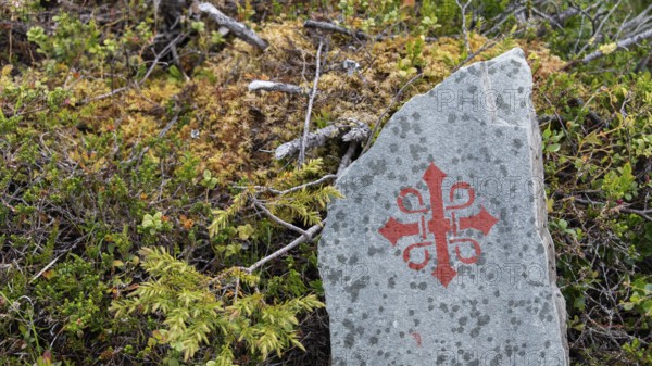 Slate plaque with Olav's Cross waymarking for pilgrims, Olav's Way or Olavsleden, old Kongevegen or King's Way over Dovrefjell, Norway