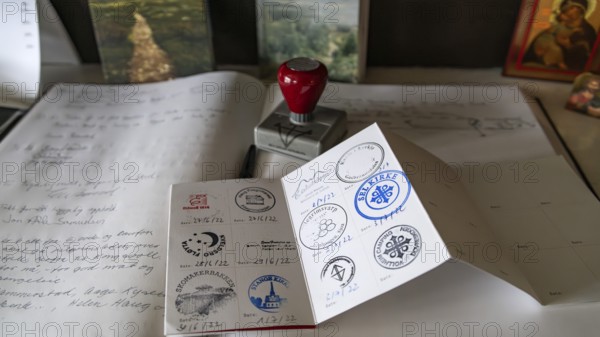 Stamp in a pilgrim's passport on a guest book, pilgrimage route Olavsweg or Olavsleden, Gudbrandsdalen or Gudbrandsdalen, Norway
