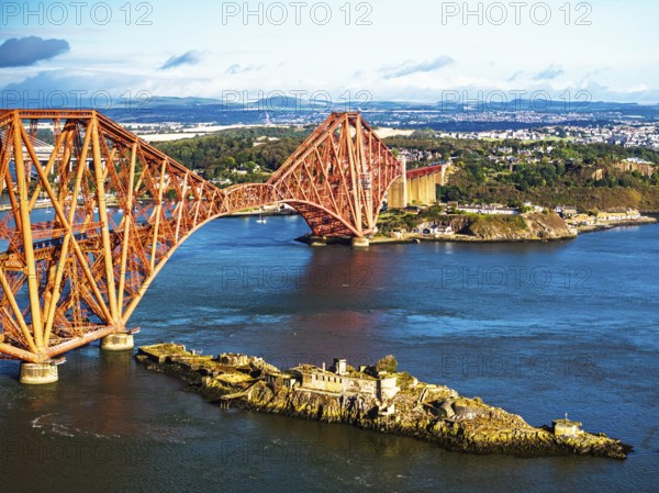 Inch Garvie Castle from a drone, Forth Bridge, Queensferry Crossing, Forth Estuary, Scotland, United Kingdom