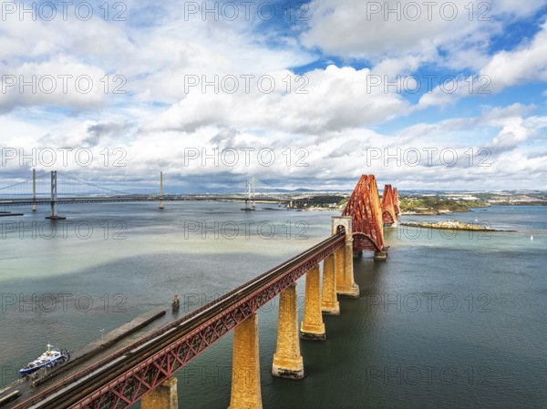 Forth Bridge from a drone, Queensferry Crossing, Forth Estuary, Scotland, United Kingdom