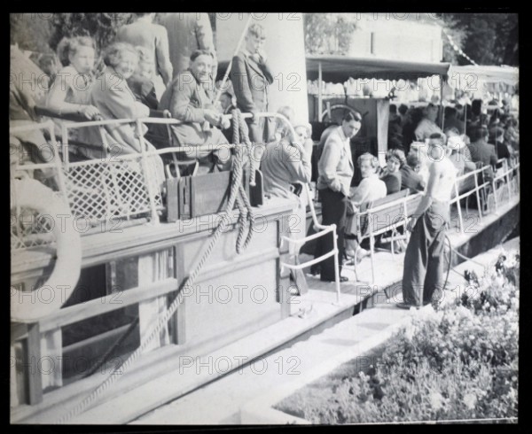 People sitting aboard River Thames steam packet ferry boat either SL Streatley or SS Nuneham, London, England, UK 1920s 1930s thought to be at the Karsino of Fred Karno