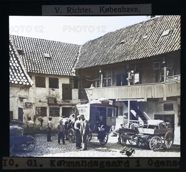 Colourised version Købmandsgaard, horse and carriage in merchant's yard, Odense, Denmark c 1900 by V Richter