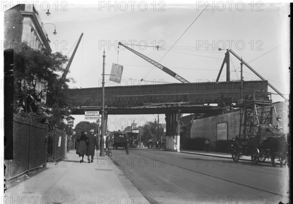 Construction or repair work on railway bridge, Finchley Road, Golders Green, London, England, UK 1920s or 1930s