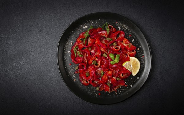 Salmon gravlax with beetroot, Scandinavian snack, beet gravlax, lightly salted fish, homemade, no people
