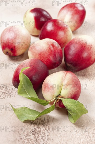 Nectarine scattered on the table, top view, close-up, no people