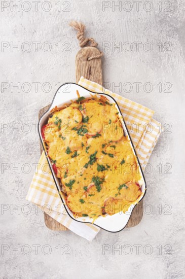 Madame Bovary's Georgian dish, chicken fillet with mushrooms, tomatoes and cheese, baked in a mold