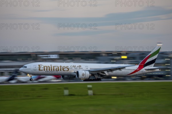 Emirates Boeing 777-300, lands at Düsseldorf Airport, North Rhine-Westphalia, Germany