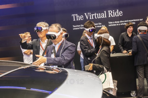 Mercedes trade fair stand with virtual presentation. Trade fair visitors with 3D glasses. The Virtual Ride. CLA Shooting Brake. IAA MOBILITY in Munich. The motor show presents itself as a holistic mobility trade fair. But cars are still the centre of attention. Munich, Bavaria, Germany