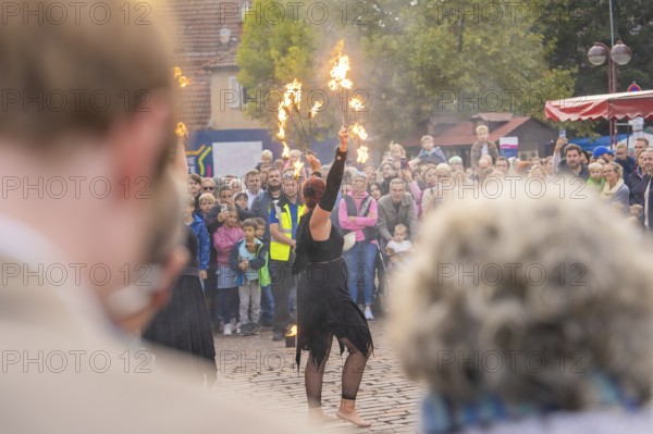 An artist thrills a large crowd with an impressive fire show, Feuernacht, Sindelfingen, Germany