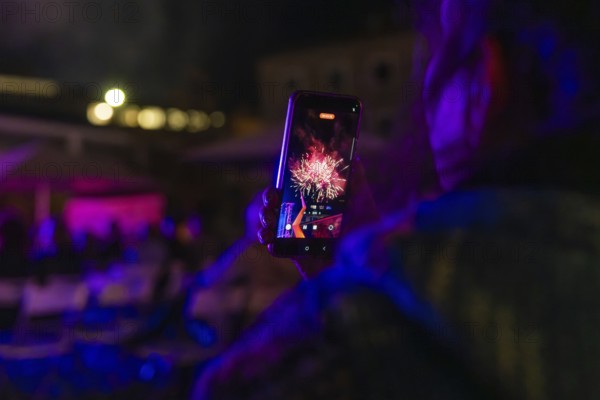 View of fireworks on smartphone at night, Fire Night, Sindelfingen, Germany