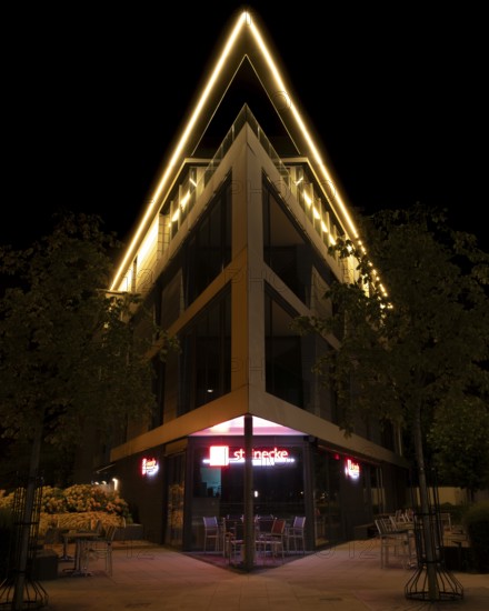 Night shot of a striking building in Hanover Herrenhausen, Hanover, Lower Saxony, Germany