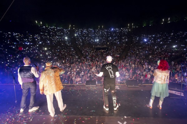 Jörn Brumme (boss / voc, fl, git), Peter Schenderlein (director / voc, piano, keyb), Max von Thien (leader / voc, drum, perc) and Blanche Elliz (boss, vic, acc, perc) at the 25th Berlin Flashlight Concert at the Berlin Waldbühne on 20.09.2025