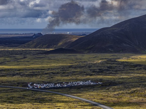 Lava, lava field, summer, cloudy, sunny, volcanic eruption, aerial view, tourists, car park, July 2025, Grindavik, Sundhnúkur crater series, Fagradalsfjall, Reykjanes, Iceland
