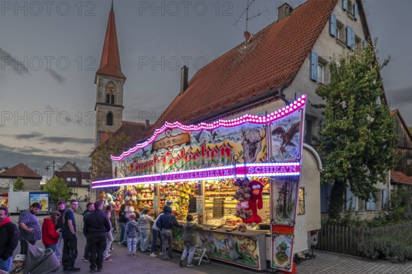 Shooting range in the evening at the parish fair in the village of Eschenau, Middle Franconia, Bavaria, Germany