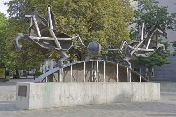 Magdeburg hemispheres by Thomas Virnich 2012, monument to physicist and mathematician Otto von Guericke, two equestrian figures pull apart halved sphere, inventor, negative pressure, vacuum, symbol, power, strength, separate, struts, inside, landmark, Ratswappenplatz, Magdeburg, Saxony-Anhalt, Germany