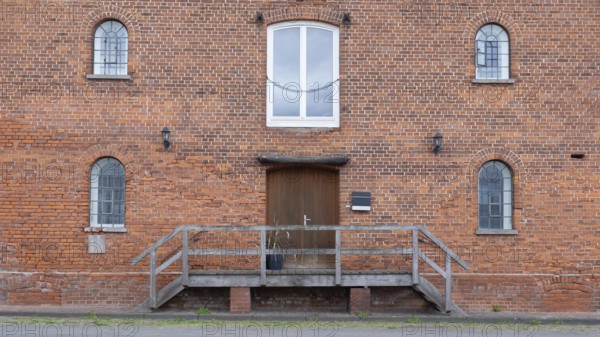 View of the façade of an old brick building, Asendorf, Diepholz district, Lower Saxony, Germany
