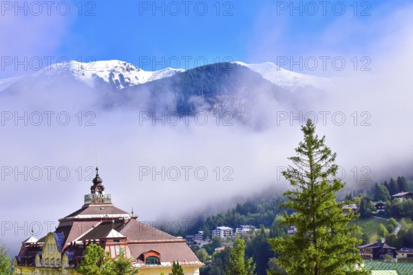 View over the village of Bad Gastein towards the snow-covered Ankogel group in the province of Salzburg, Austria