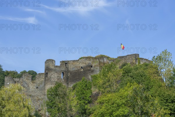 9th century medieval ruined hill castle overlooking the city La Roche-en-Ardenne in summer, province of Luxembourg, Ardennes, Wallonia, Belgium