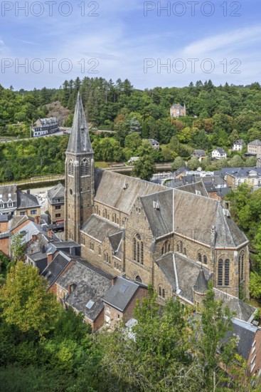 St. Nicholas Church seen from the castle ruins in the city La Roche-en-Ardenne in summer, province of Luxembourg, Ardennes, Wallonia, Belgium