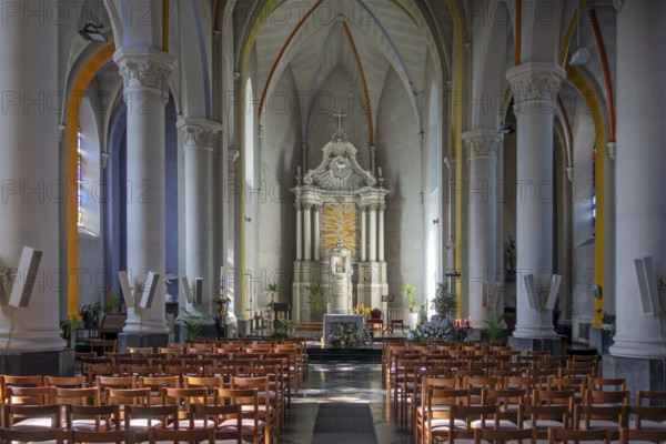 Altar of the 19th century Gothic Revival Saint Martin church in the village Beauraing, province of Namur, Wallonia, Belgium